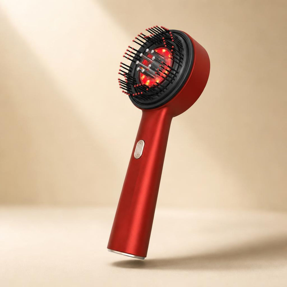 Blushvelle Root Ritual scalp brush standing upright with its red LEDs glowing